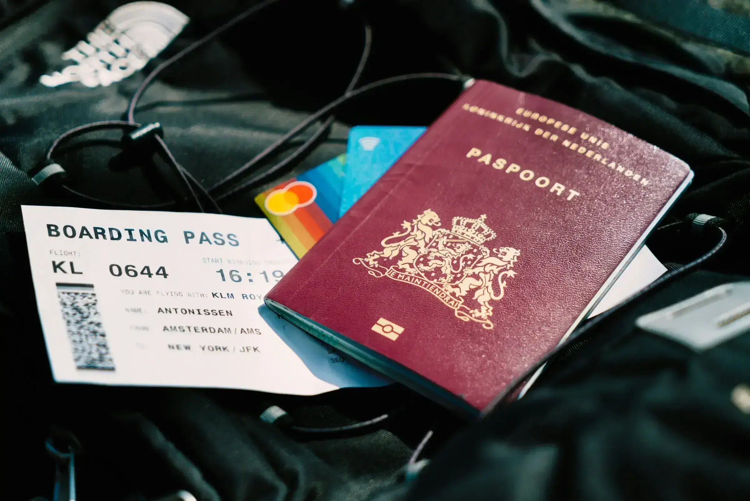 Two passports laid open side by side on a clean surface — the practical expression of international citizenship.