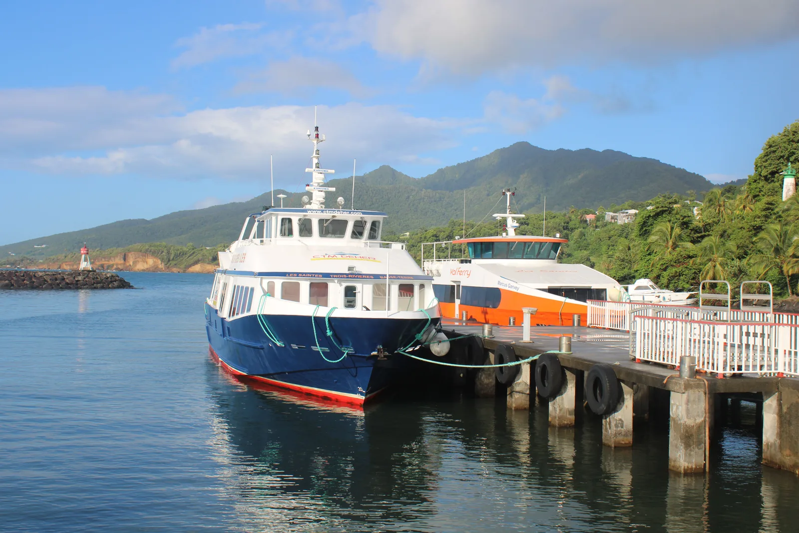 Roseau harbour and the mountain landscape of Dominica, where new citizens will need to spend time under the country's updated CBI rules.
