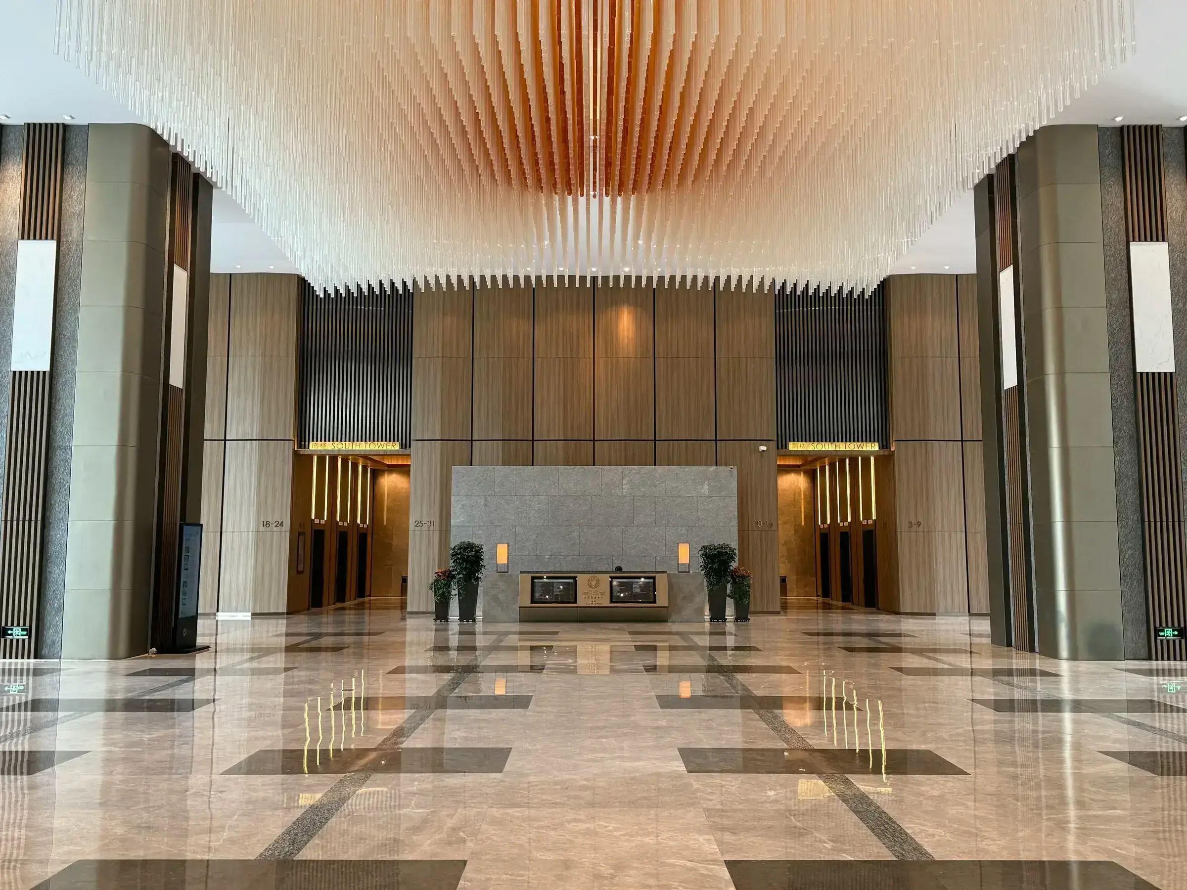A measured, marble-floored bank interior — the regulated environment in which source-of-funds verification takes place.