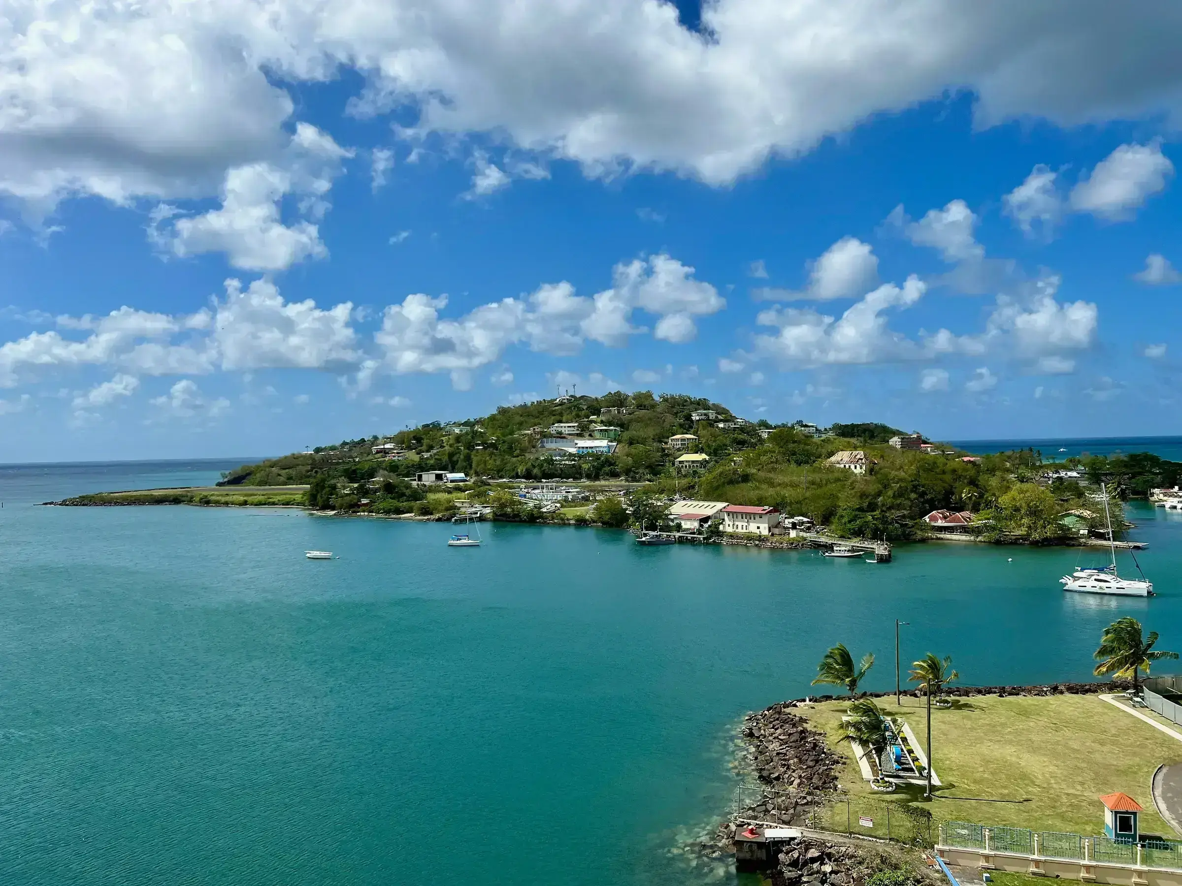 A St Lucian coastal view with the Pitons in the distance.