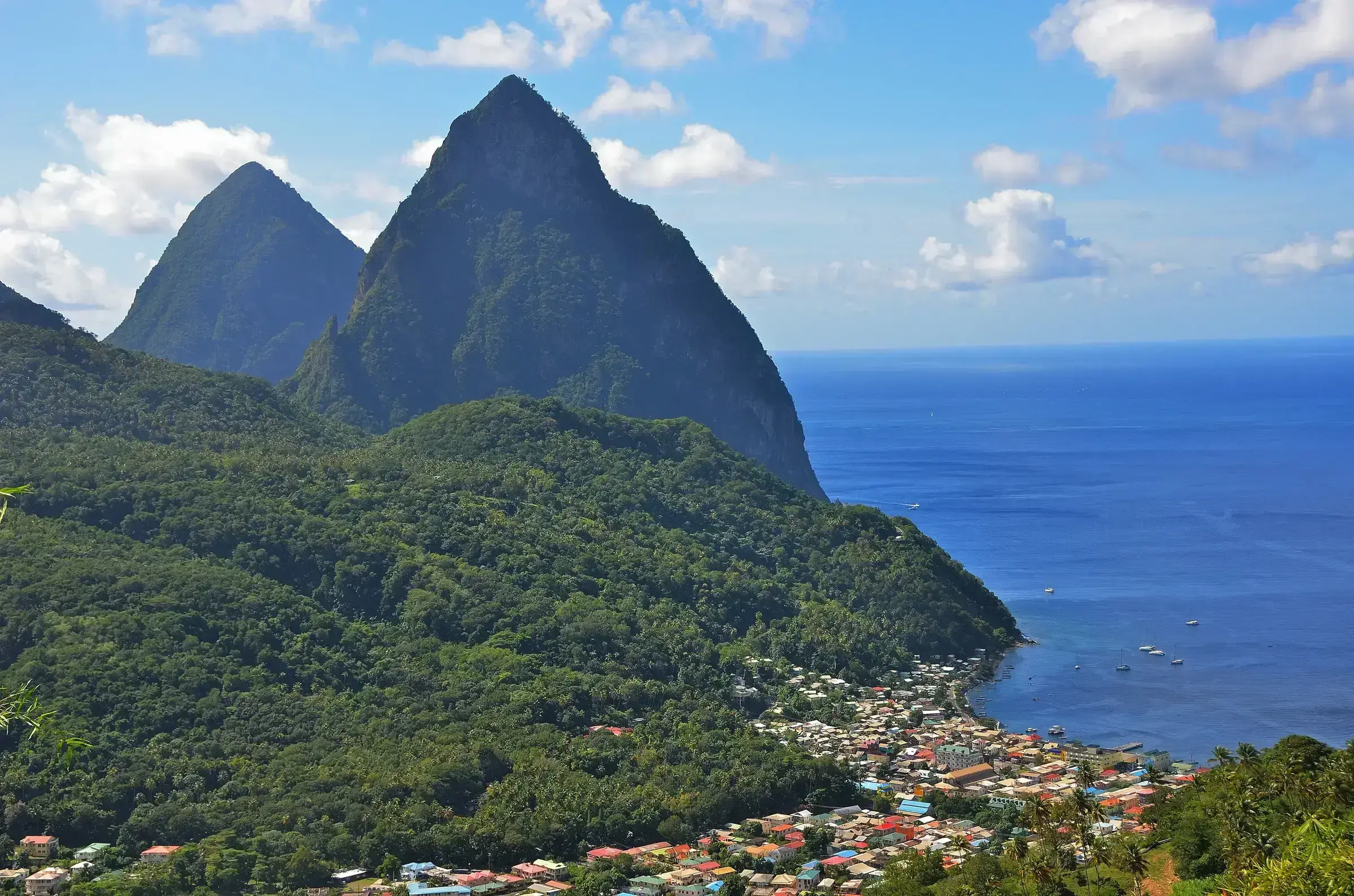 The Pitons rising sharply out of the Caribbean Sea — the unmistakable signature of St Lucia's landscape.
