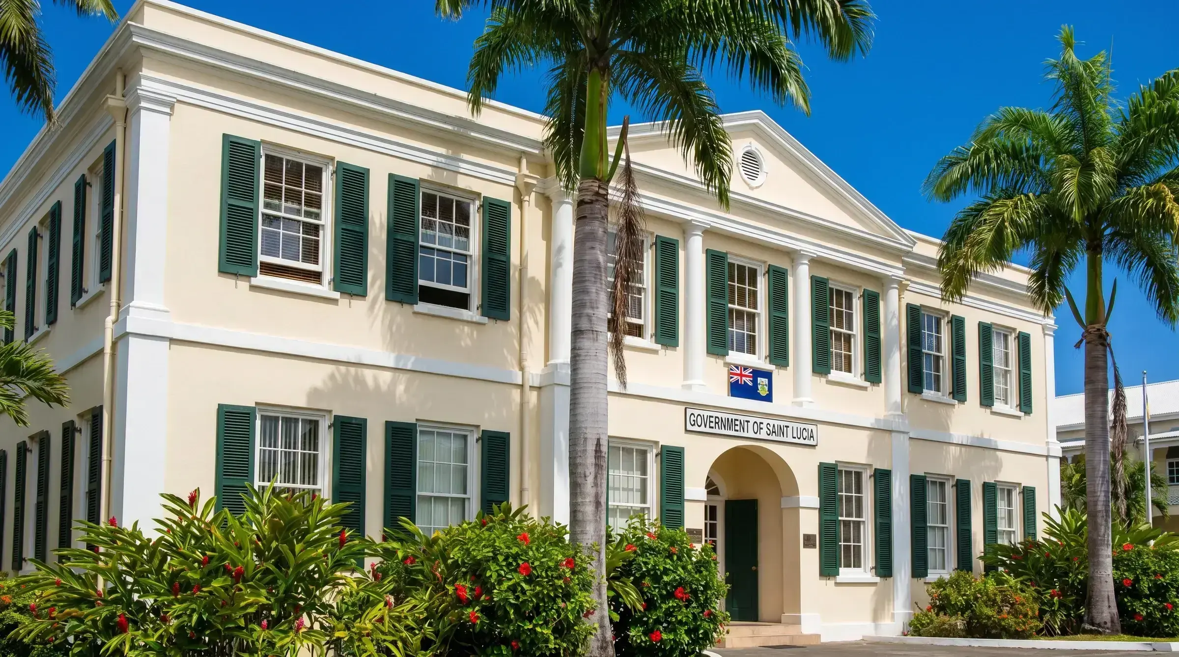 The colonial Government of Saint Lucia building exterior in Castries — the formal architectural register of the country's regulatory authority.