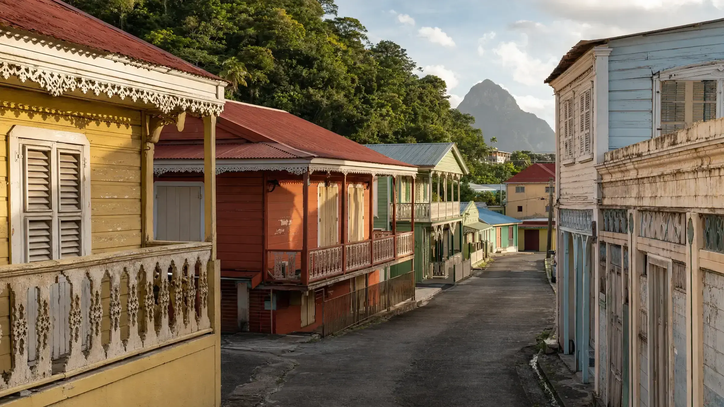 A Caribbean coastal town and harbour viewed from the hillside