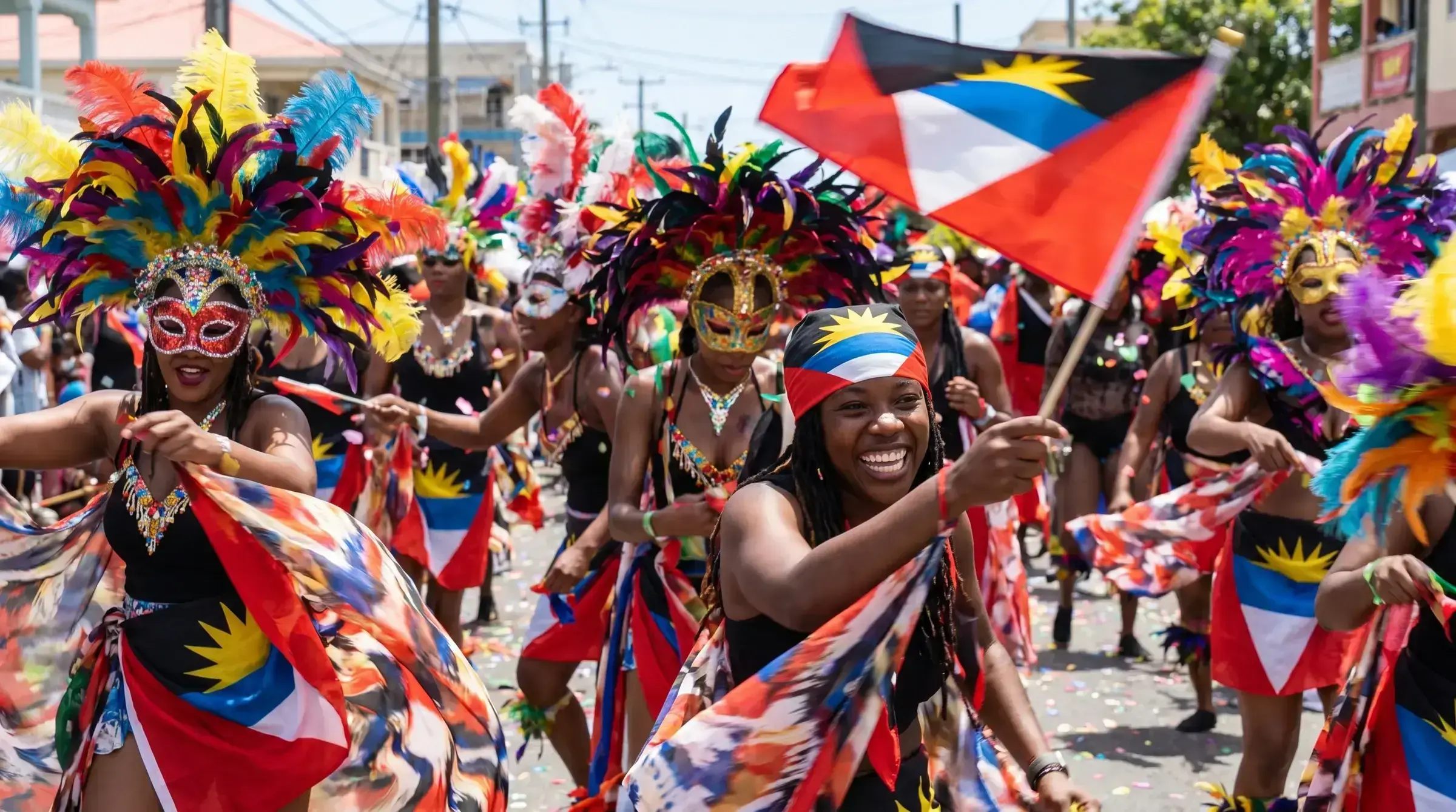 Masquerade troupes parading at Antigua Carnival in St John's — the annual celebration of emancipation that anchors the country's cultural calendar.